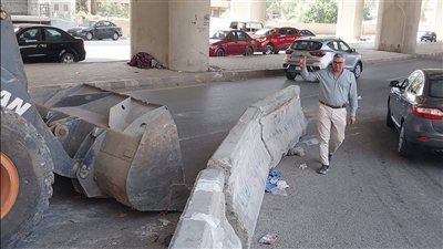 تركيب حواجز خرسانية بشارع أحمد نصر في الجيزة لمنع  السير عكس الاتجاه